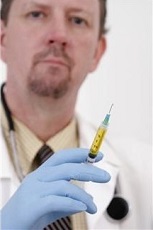 Physician with hypodermic needle